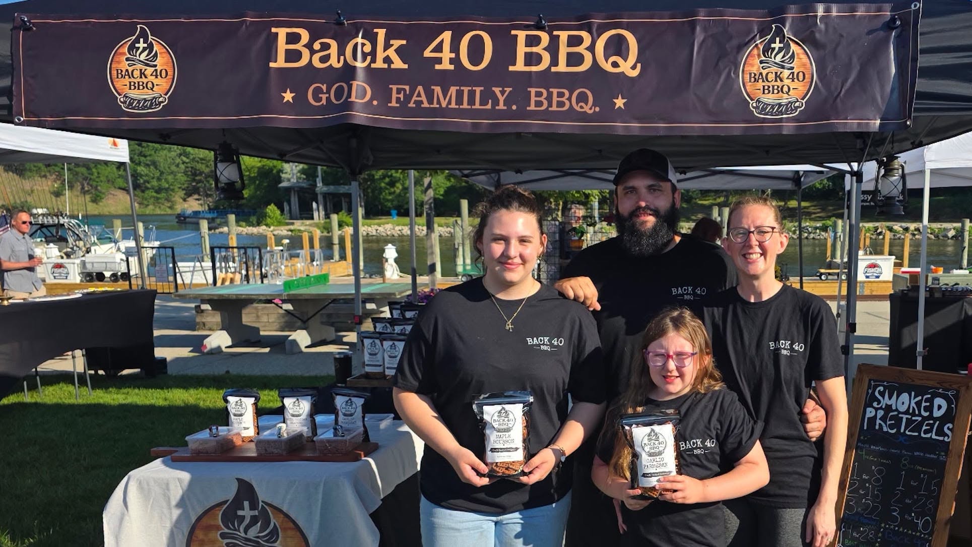 The Back 40 BBQ family at their vendor booth